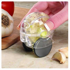 Rolling garlic chopper with compact design, ideal for quick, mess-free garlic mincing and easy kitchen prep.