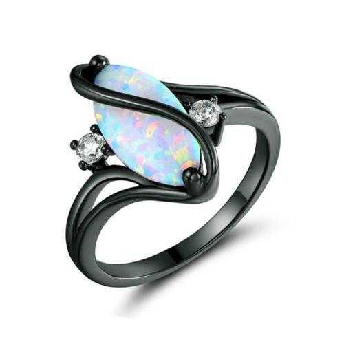 Elegant opal ring with iridescent gemstone and delicate band, perfect for everyday wear or special occasions.